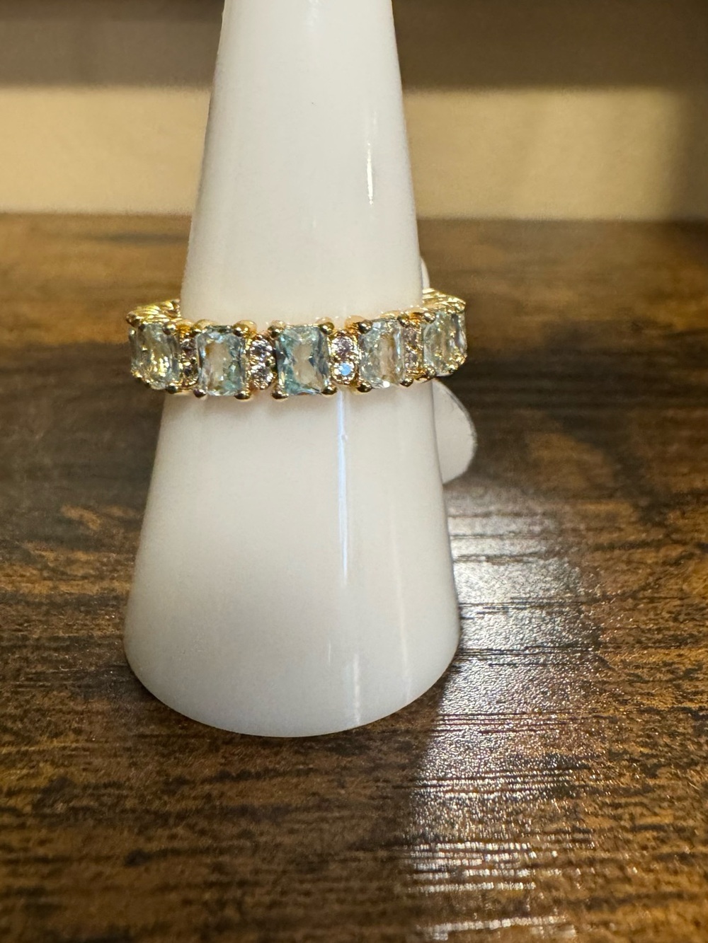 Bomb Party Gold Ring with Light Blue Emerald-Cut Stones